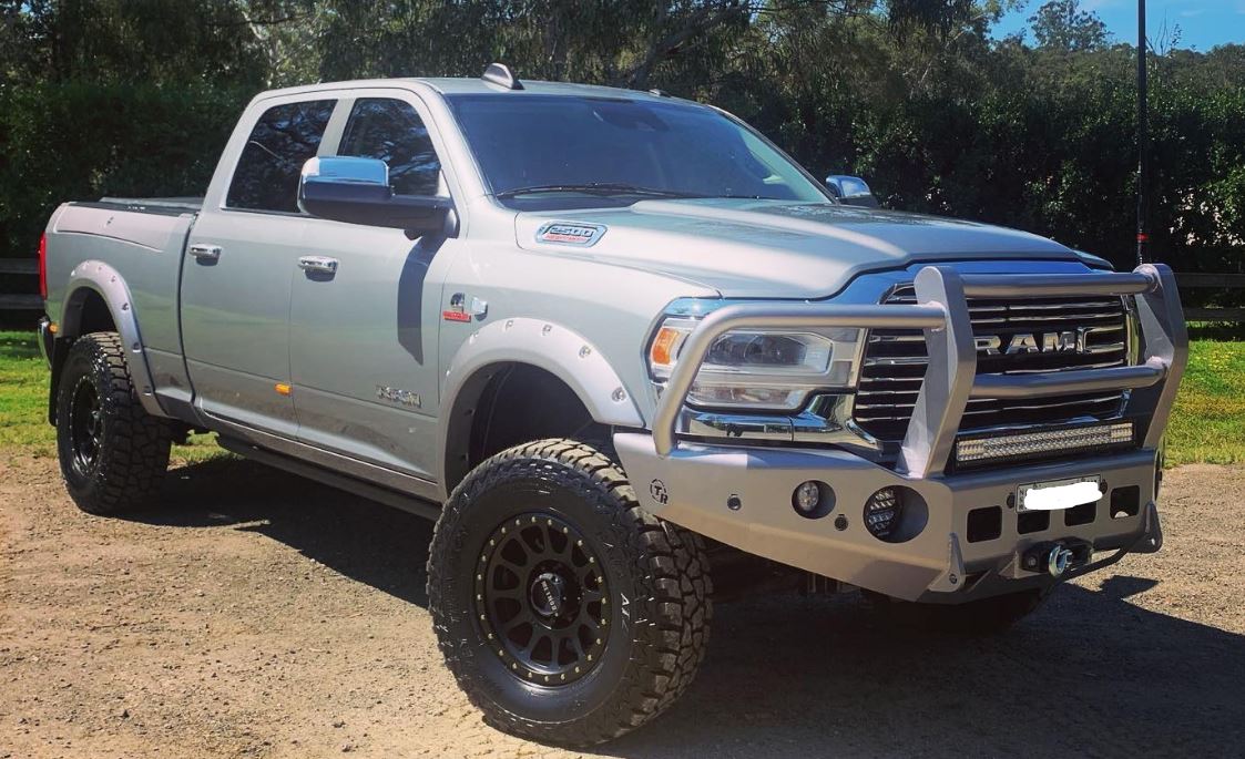 Heavy-duty TRAILREADY DJII 2500/3500 full guard bullbar by Trucks N Toys mounted on a truck for off-road protection.