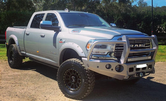 Heavy-duty TRAILREADY DJII 2500/3500 full guard bullbar by Trucks N Toys mounted on a truck for off-road protection.