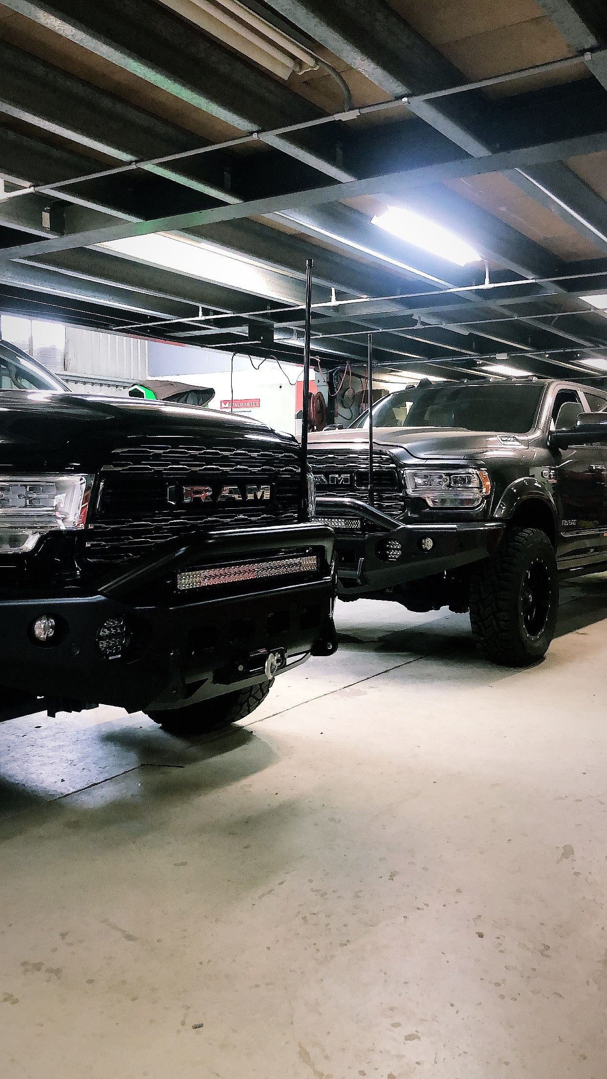 TrailReady DJII 2500/3500 pre-runner bullbar on a 2019+ truck, featuring durable metal construction with mounting points for off-road protection.