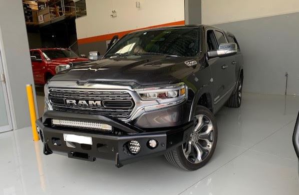 Side view of a Trucks N Toys TRAILREADY 2019+ DT 1500 Pre-Runner diecast truck with detailed paint and realistic features.
