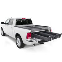 DECKED Drawer System installed in RAM 1500 Express, 2500, and 3500 trucks, featuring sturdy metal drawers and organized storage.