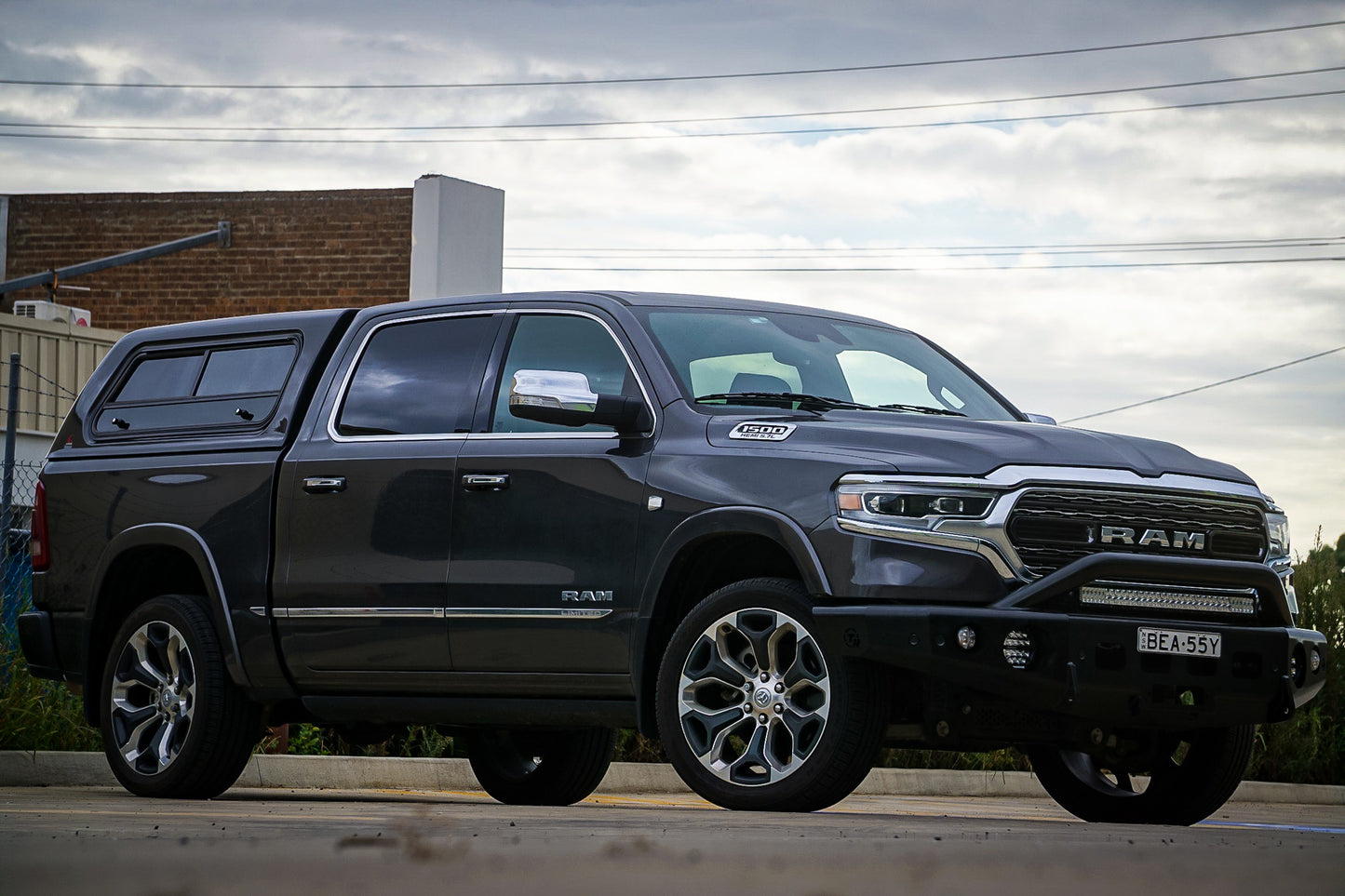 TrailReady 2019+ DT 1500 Pre Runner truck wheels and tires mounted on a vehicle, showcasing off-road performance and rugged design.