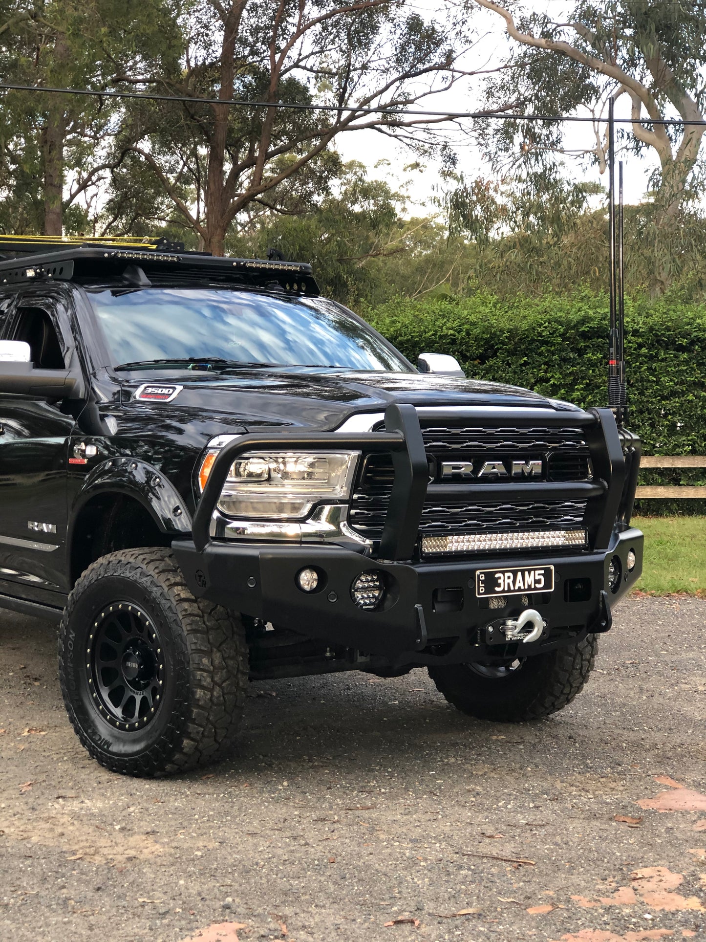 TrailReady DJII 2500/3500 full bullbar for 2019+ trucks, sturdy steel guard with rugged design, installed on a pickup truck.