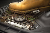 HUSKY LINERS X-ACT AXS mud and dirt-resistant truck bed liner for Dodge Ram 1500 Crew Cab, showing textured black surface.