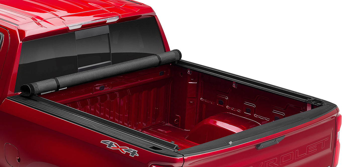 LUND Motion Products Inc Roll Up SOFT Tonneau cover on Ram 1500 Express, 2500, and 3500 trucks, shown rolled up on the truck bed.