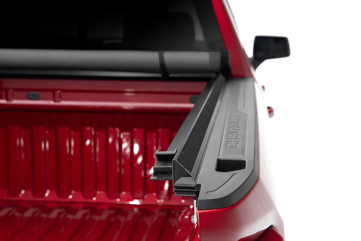 LUND Motion Products Inc Roll Up SOFT Tonneau cover on Ram 1500 Express, 2500, or 3500 pickup truck, shown rolled open for bed access