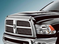 Smoked bonnet protector for RAM 2500 and 3500 trucks by Geared for Adventure, showing the tinted, protective cover on the vehicle's front.