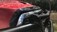 Smoked bonnet protector for RAM 2500 and 3500 trucks by Geared for Adventure, mounted on the vehicle's front hood.