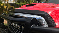 Smoked bonnet protector for RAM 2500 and 3500 trucks by Geared for Adventure, shown installed on vehicle hood.