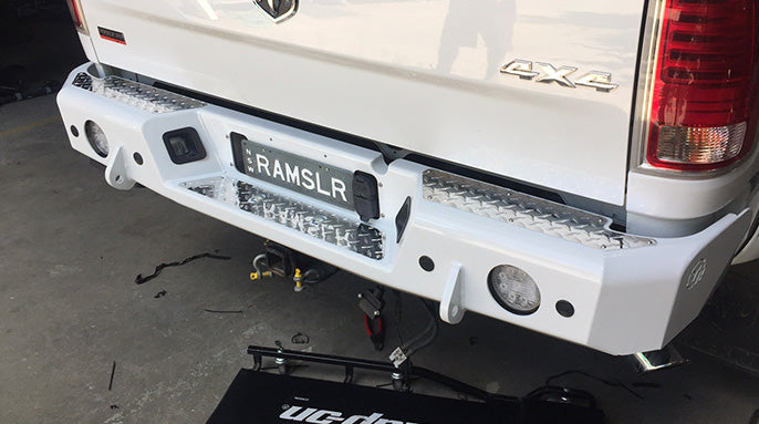 TrailReady rear bumper for RAM 2500 and 3500 trucks, rugged steel design with mounting points for enhanced off-road protection