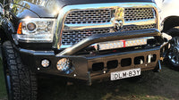 Geared for Adventure TrailReady Pre-Runner Bar installed on a RAM 2500/3500 truck, showcasing rugged off-road accessory for enhanced durability.