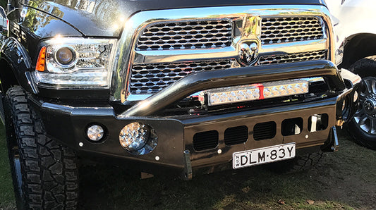 Geared for Adventure TrailReady Pre-Runner Bar installed on a RAM 2500/3500 truck, showcasing rugged off-road accessory for enhanced durability.