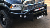 TrailReady Pre-Runner Bar by Geared for Adventure installed on RAM 2500 and 3500 trucks, showing rugged off-road design.