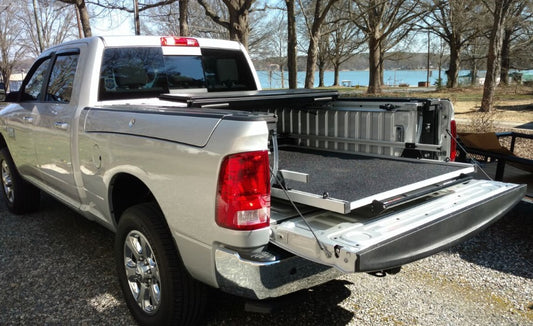 BedSlide Classic Silver bed slide installed in Ram 1500/2500 with 5'7" Rambox for secure truck bed cargo management.