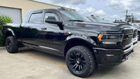 LUND Motion Products Inc. DJ 2020 Bushwacker Flares POCKET for 2500/3500 trucks, showing textured black flare with mounting details.